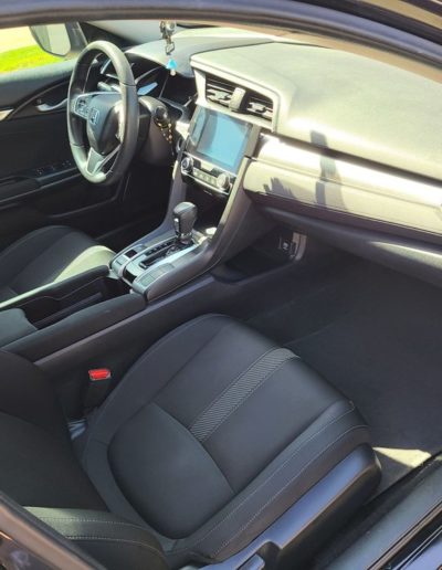 Detailed view of a car's interior showcasing spotless upholstery.
